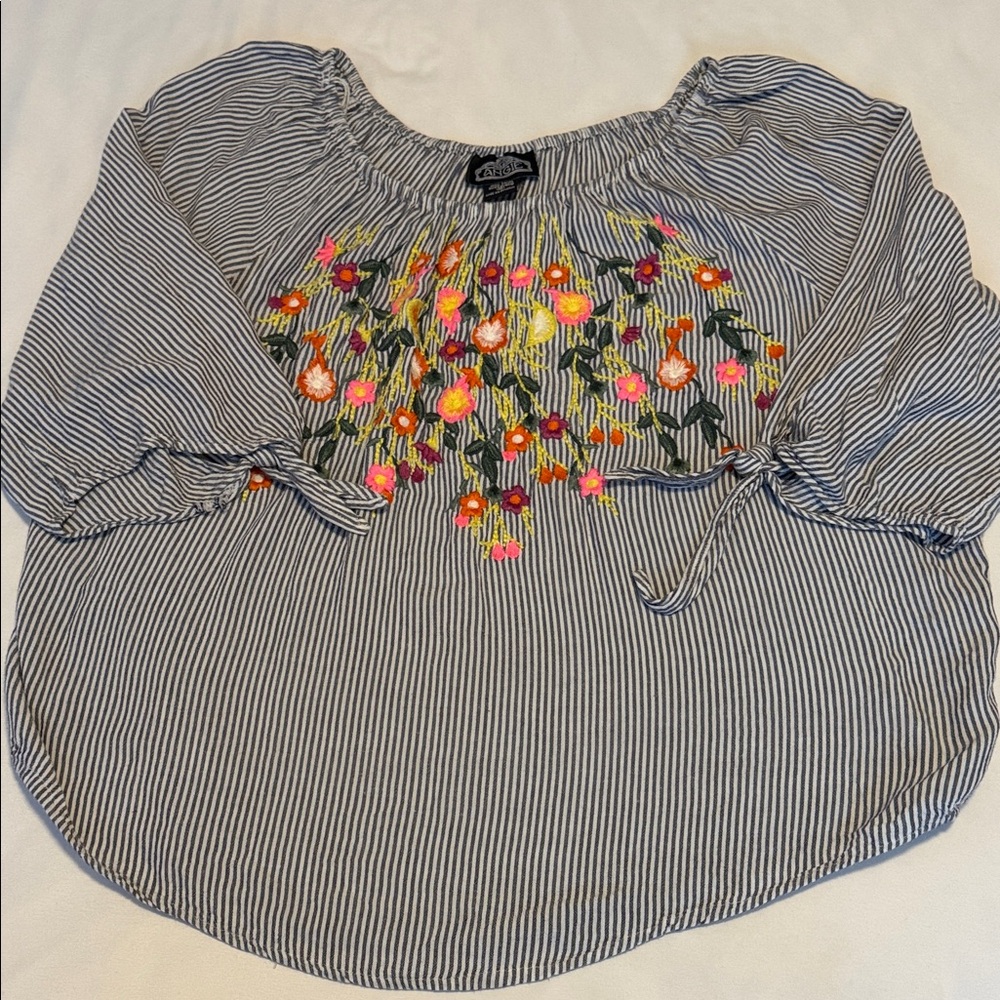 Women’s Angie striped boho blouse featuring colorful floral embroidery.